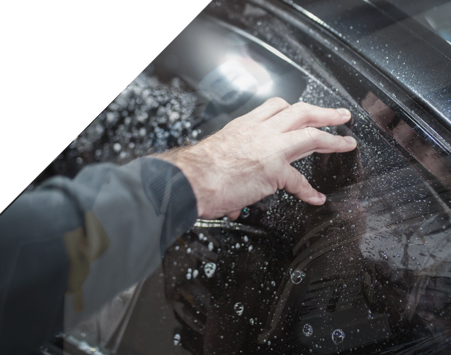 window tint montreal technician installing tint